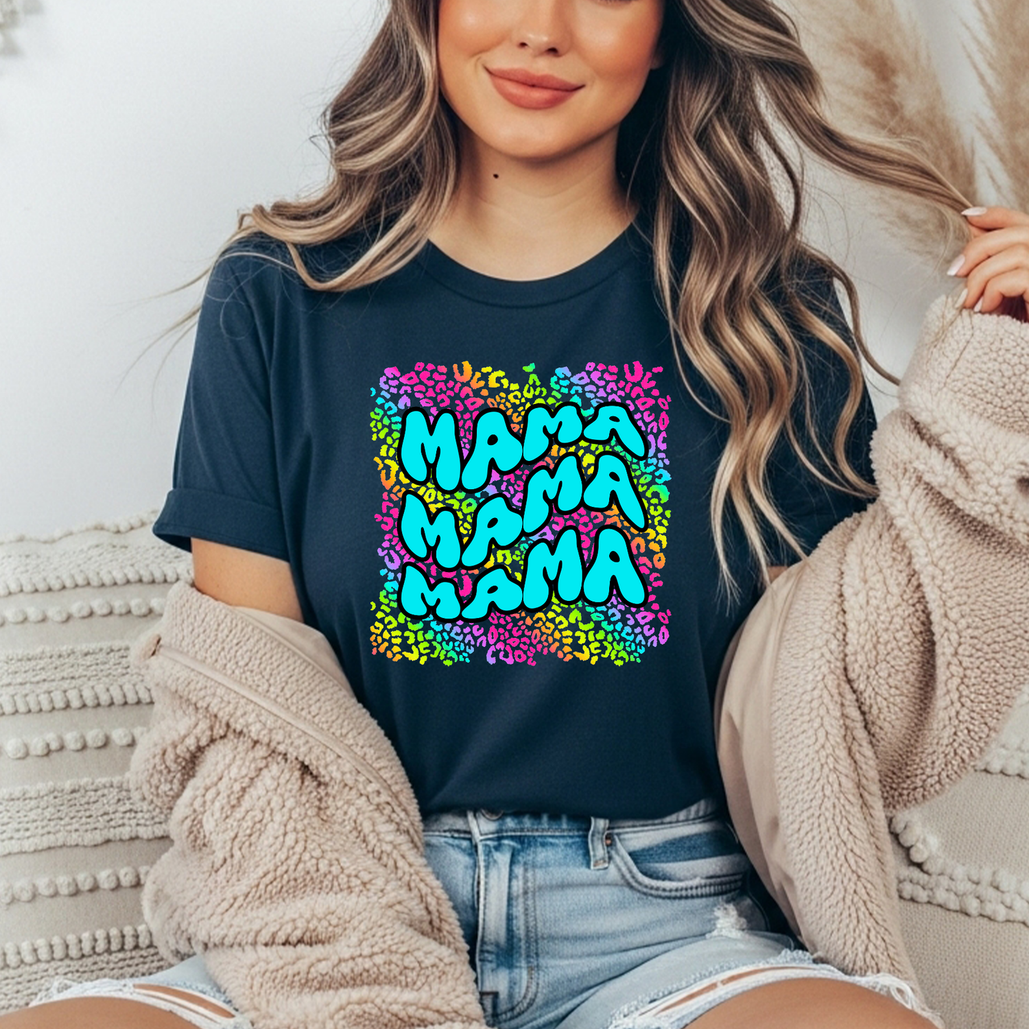 Colorful leopard print background with the word 'mama' overlaid in bold font