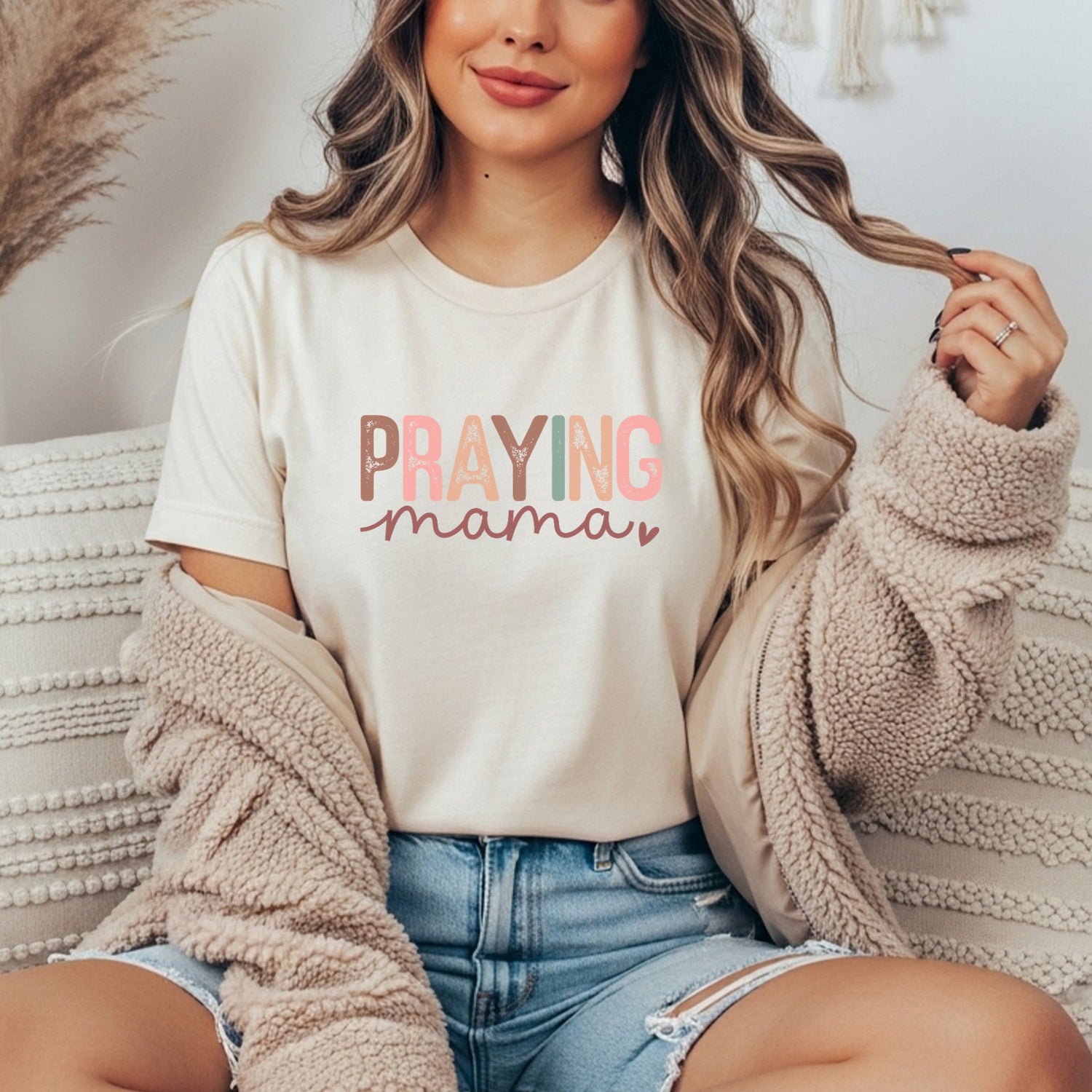 off white tee that says 'praying mama'