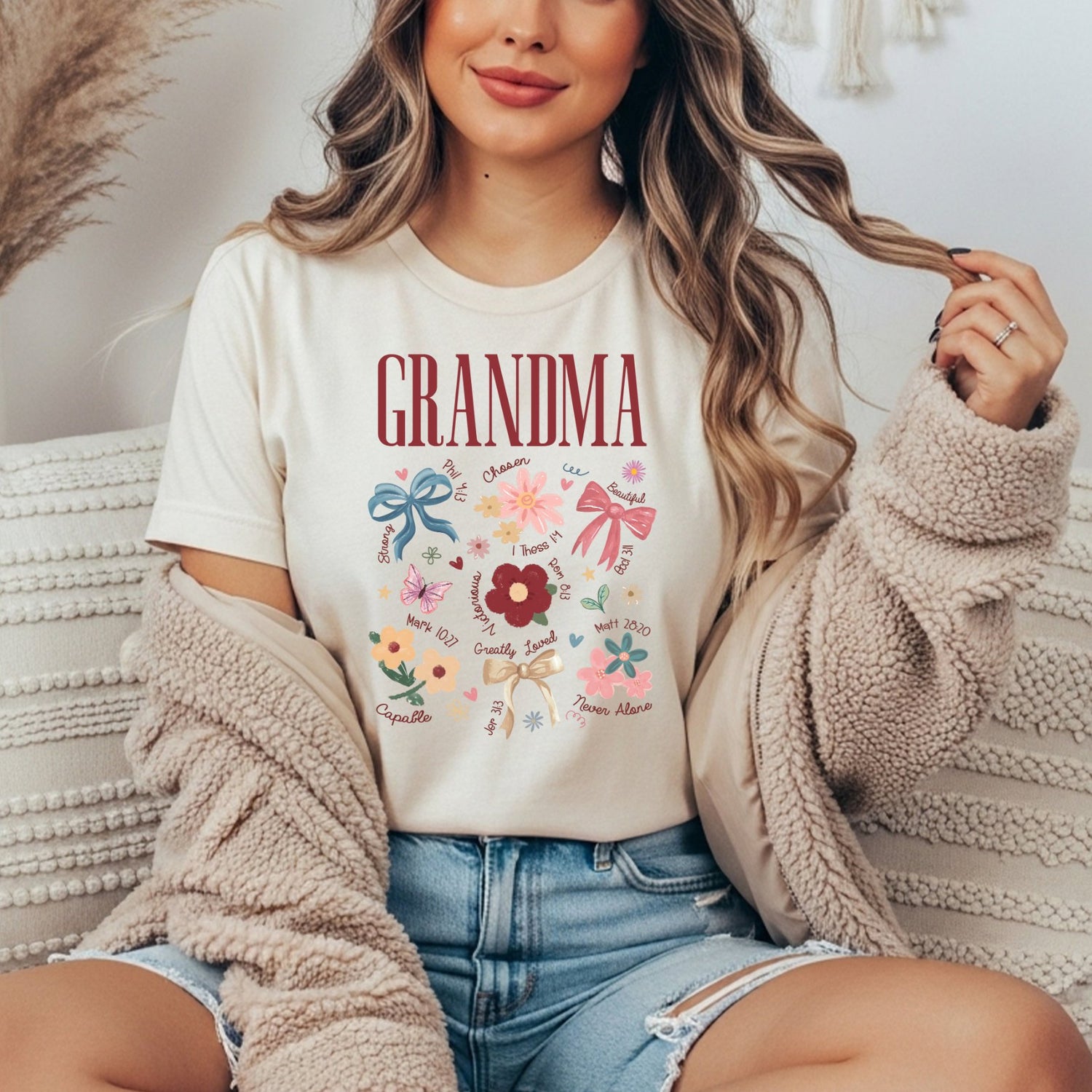 Off white tee with the word grandma surrounded by bible verses and hand-drawn doodles